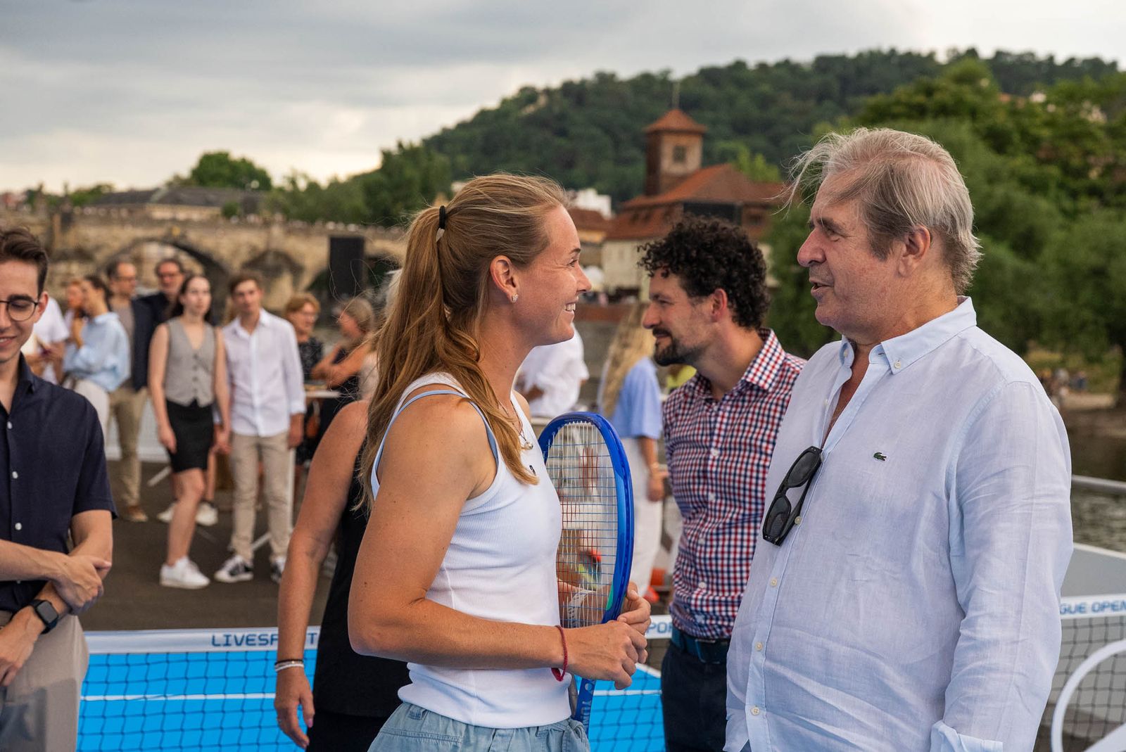 Guests of the Livesport Prague Open event on the deck of a boat