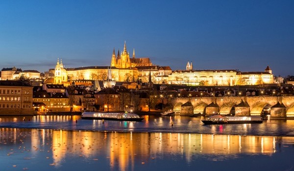 Discover evening Prague from the deck of a boat Discover evening Prague from the deck of a boat