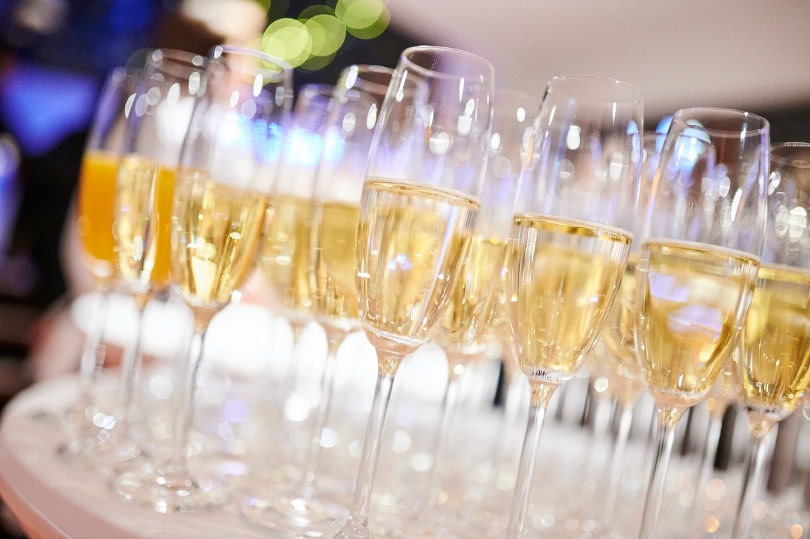 Rows of sparkling wine glasses ready for the midnight toast